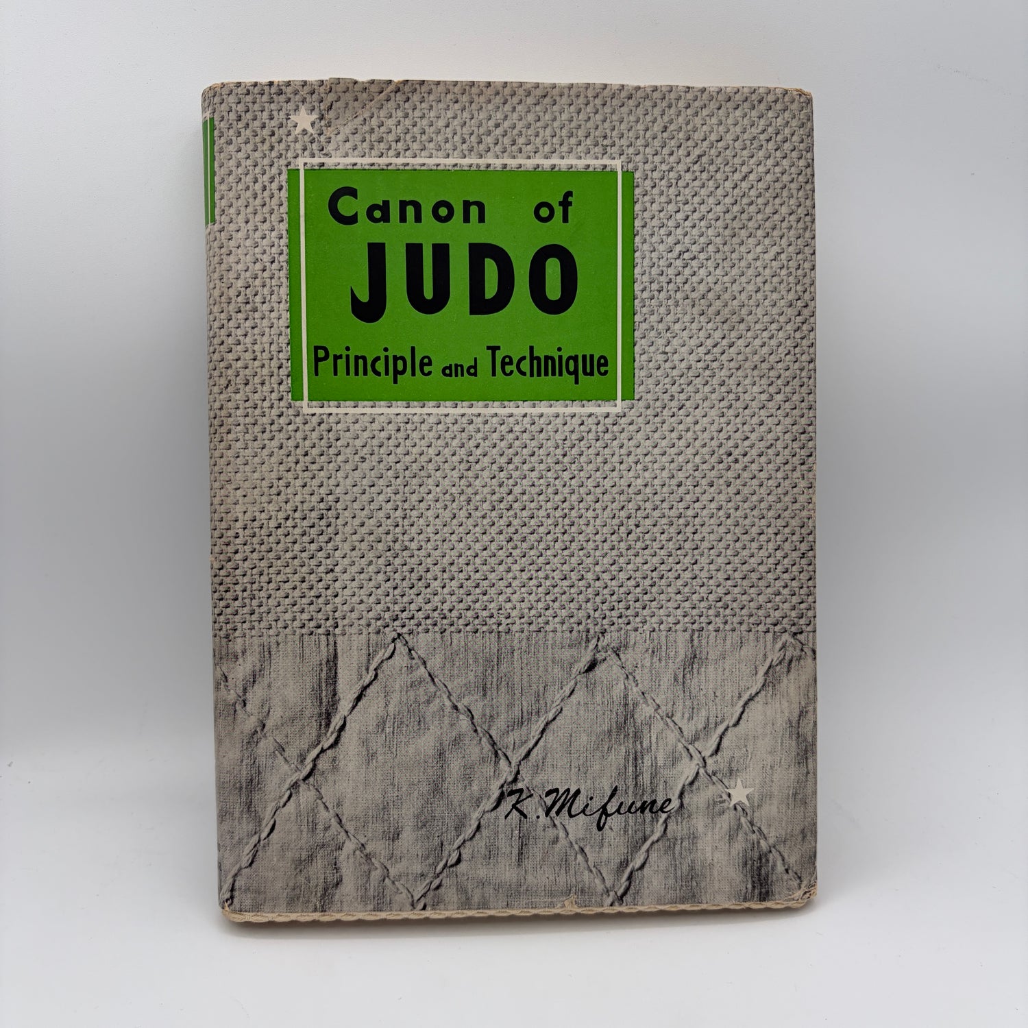 The Canon of Judo: Classic Teachings on Principles and Techniques Book by Kyuzo Mifune (1st Edition)(Hardcover)