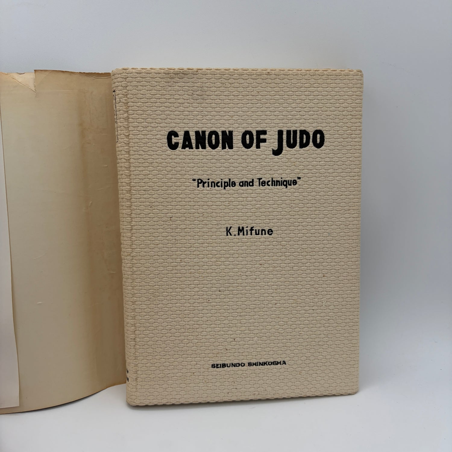 The Canon of Judo: Classic Teachings on Principles and Techniques Book by Kyuzo Mifune (1st Edition)(Hardcover)