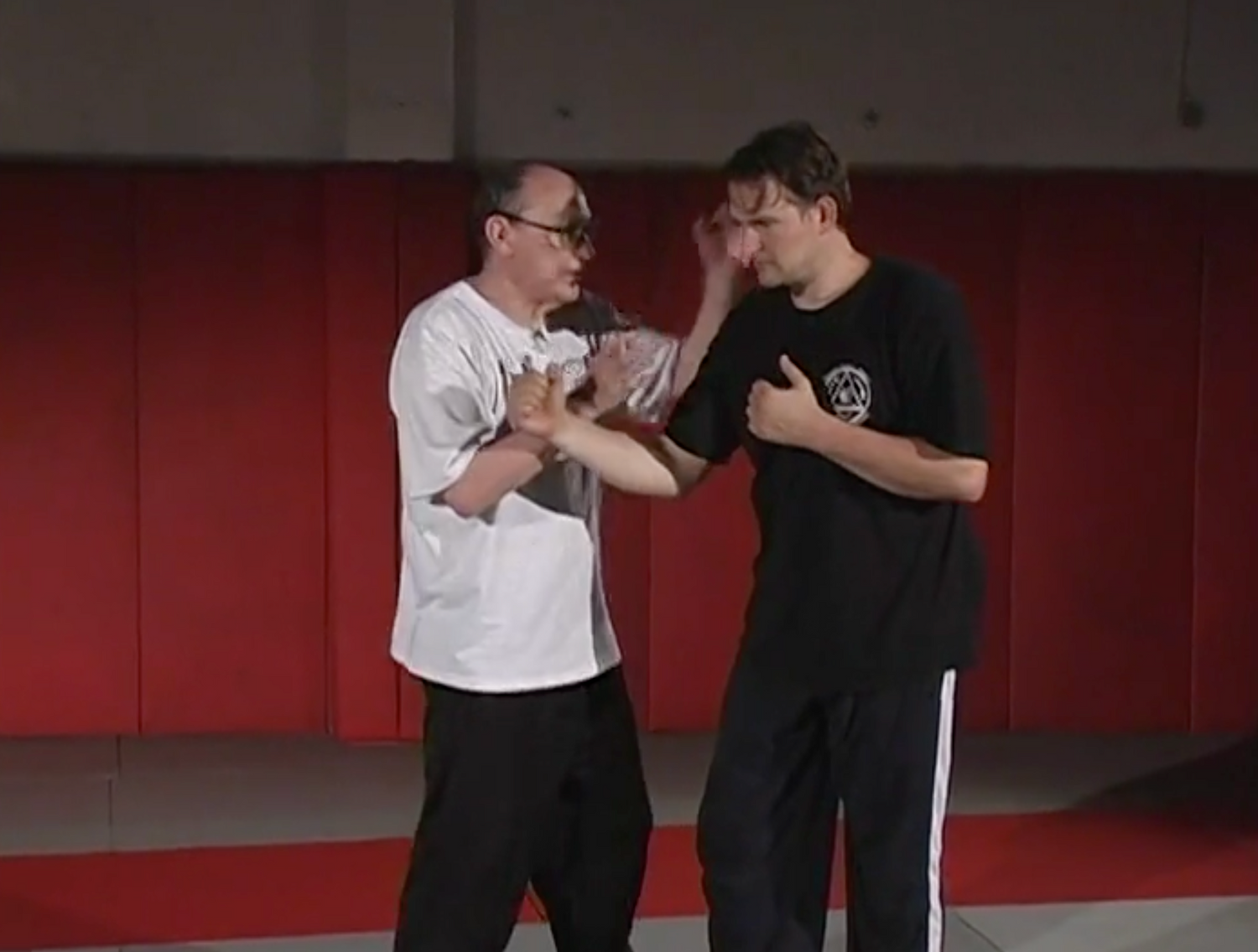 Jeet Kune Do Atrapando manos para DVD de combate con Tim Tackett 