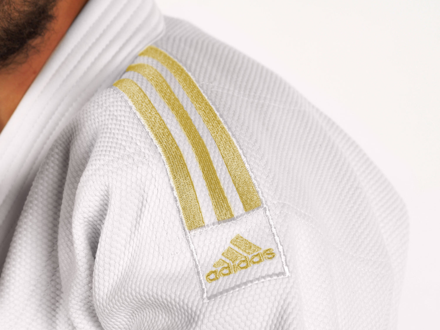 J690 Quest White & Gold  -  Double Weave by Adidas - Budovideos Inc