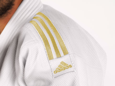 cohete chocolate social J690 Quest White & Gold - Double Weave by Adidas